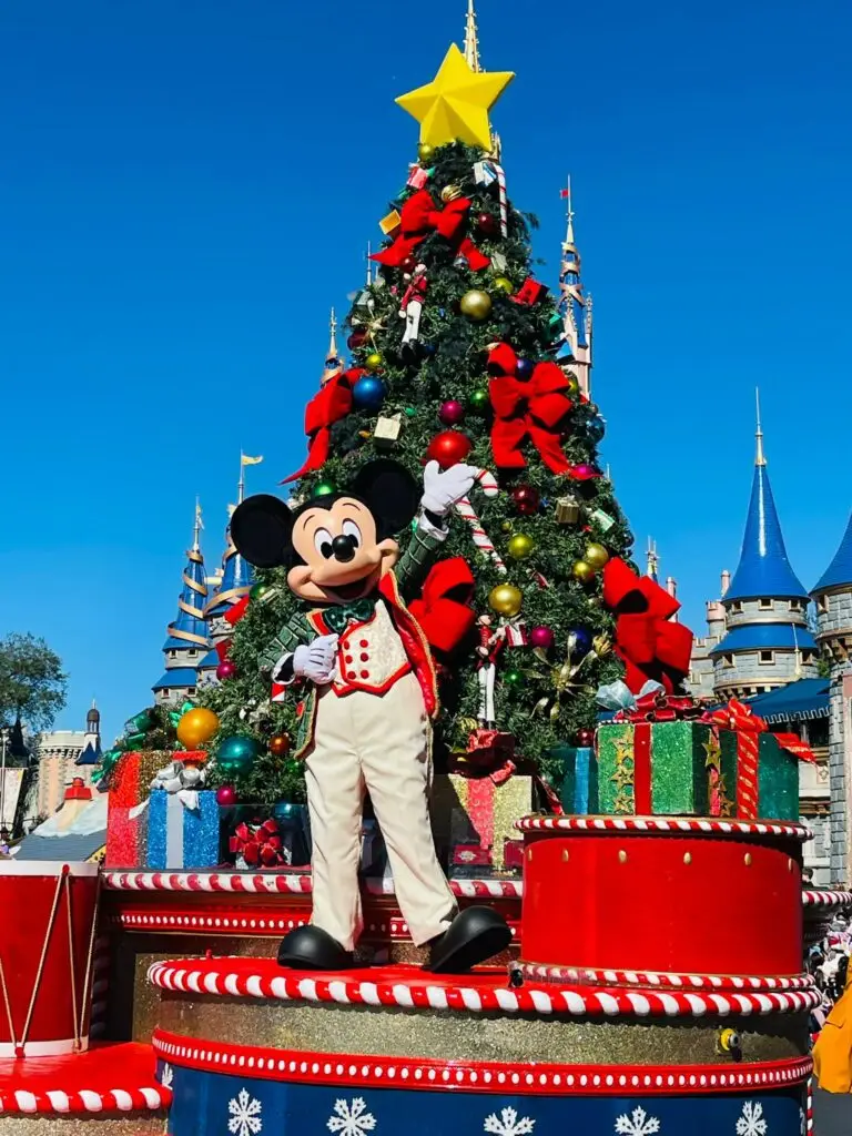 Festive Mickey Mouse on Holiday Parade Float at Mickey's Very Merry Christmas Party.