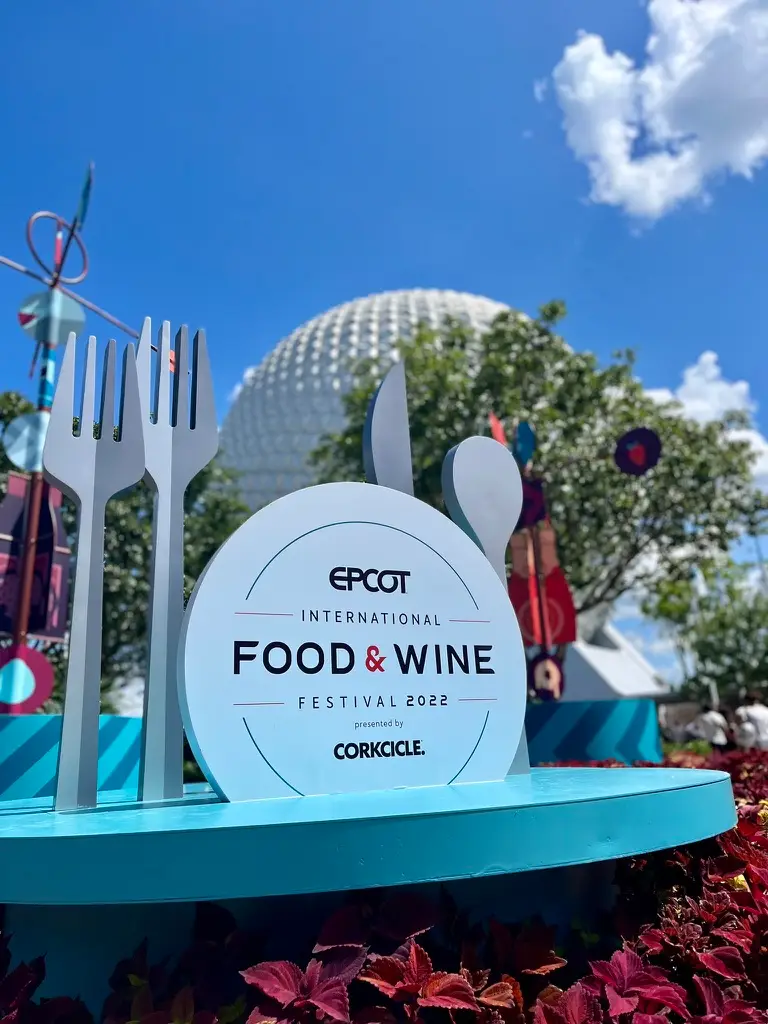 EPCOT Food and Wine Festival Presented by CORKCICLE 2022 Entrance Sign in Front of Spaceship Earth