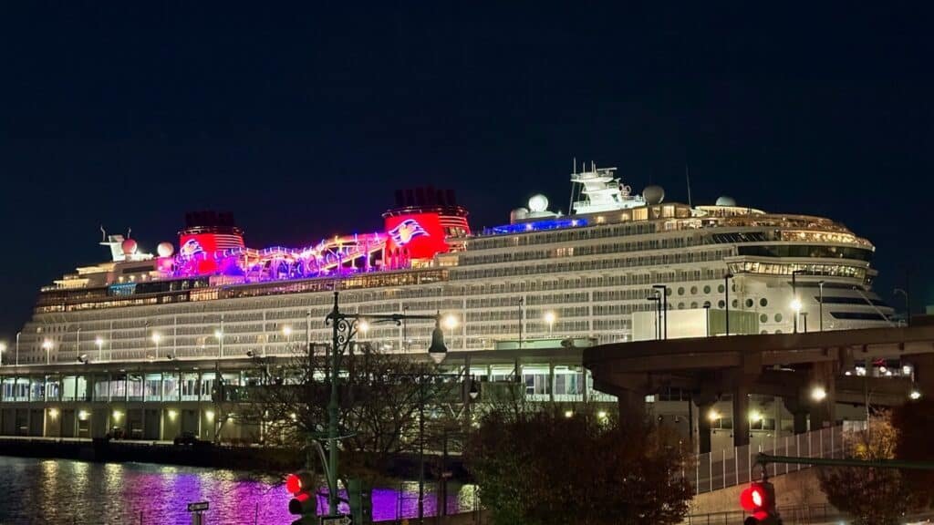 Disney's Treasure docked at New York City at Night