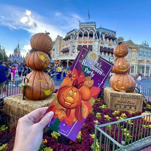 Mickey’s Not So Scary Halloween Party 2024 at Disney's Magic Kingdom features vibrant Halloween decorations, costumed characters like Mickey and Minnie, illuminated pumpkins, and delighted guests enjoying nighttime festivities, parades, and special themed treats.
